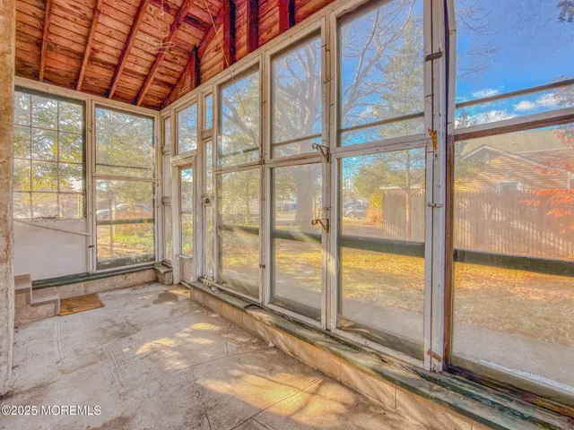 a view of an empty room with window