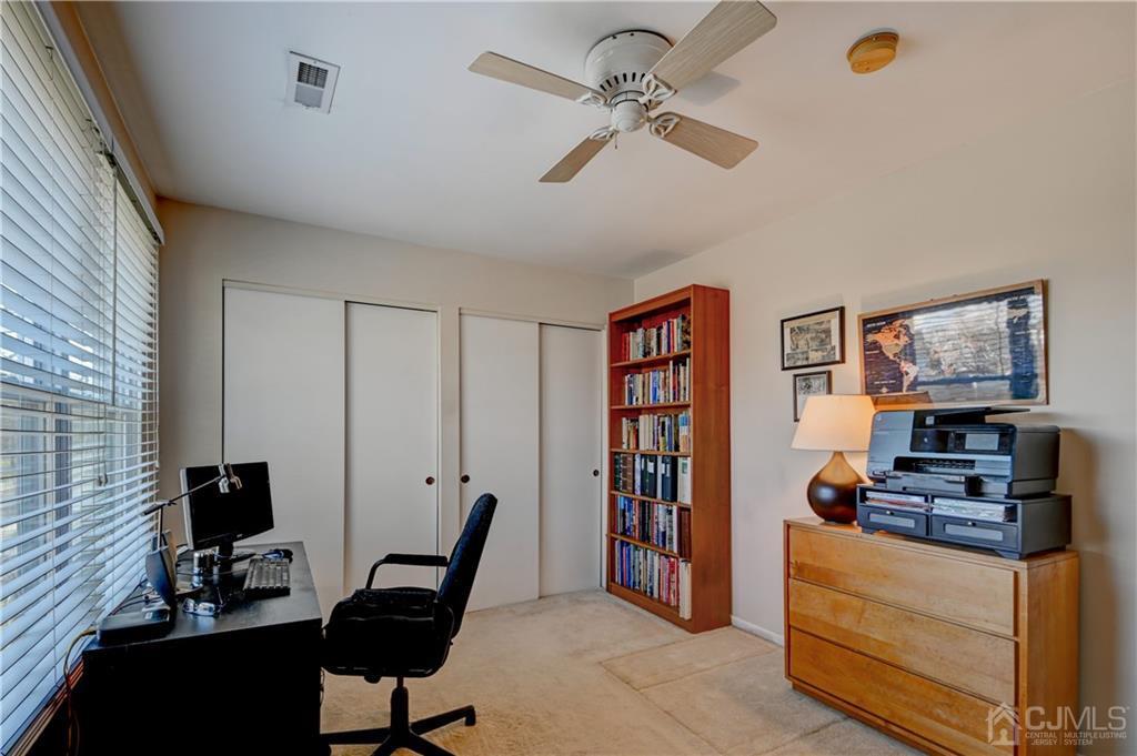 30 Pebble Road East Windsor, NJ 08520 - Photo 12 of 15 a view of a workspace with furniture and a window