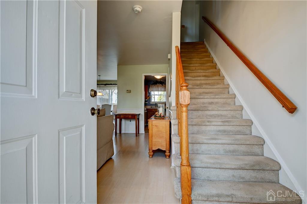 30 Pebble Road East Windsor, NJ 08520 - Photo 2 of 15 a view of entryway and hall with wooden floor