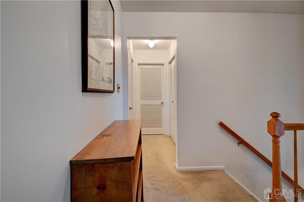 30 Pebble Road East Windsor, NJ 08520 - Photo 9 of 15 a view of a hallway with workspace