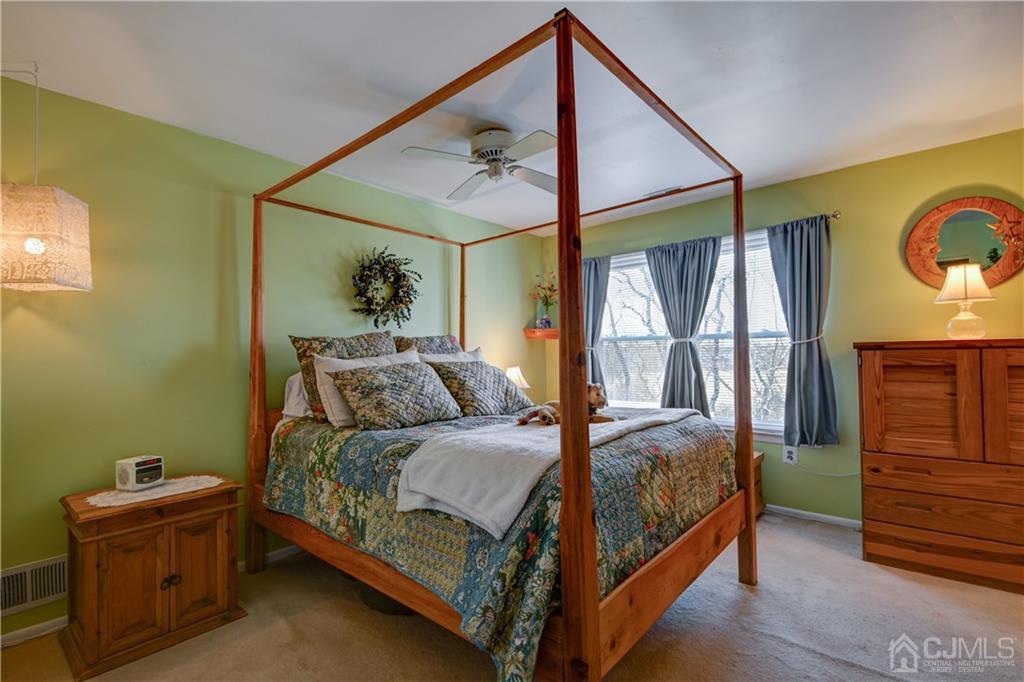30 Pebble Road East Windsor, NJ 08520 - Photo 10 of 15 a bedroom with a bed next to a window