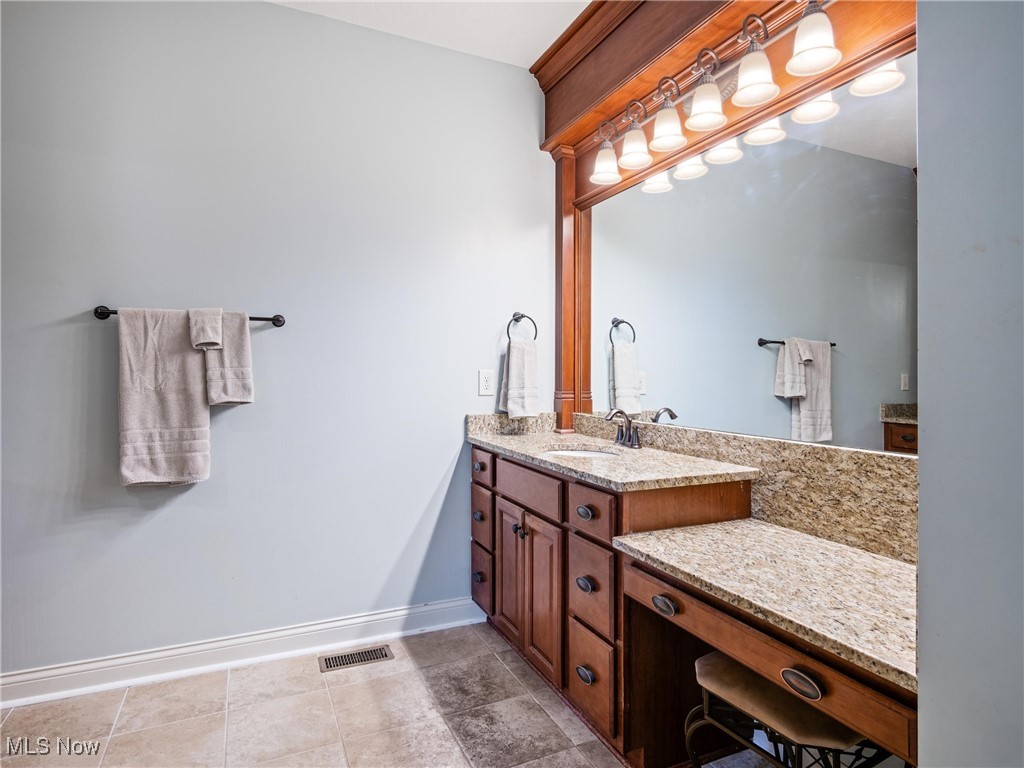 5349 Slater Ridge Westerville, OH 43082 - Photo 27 of 50 Bathroom with baseboards and vanity