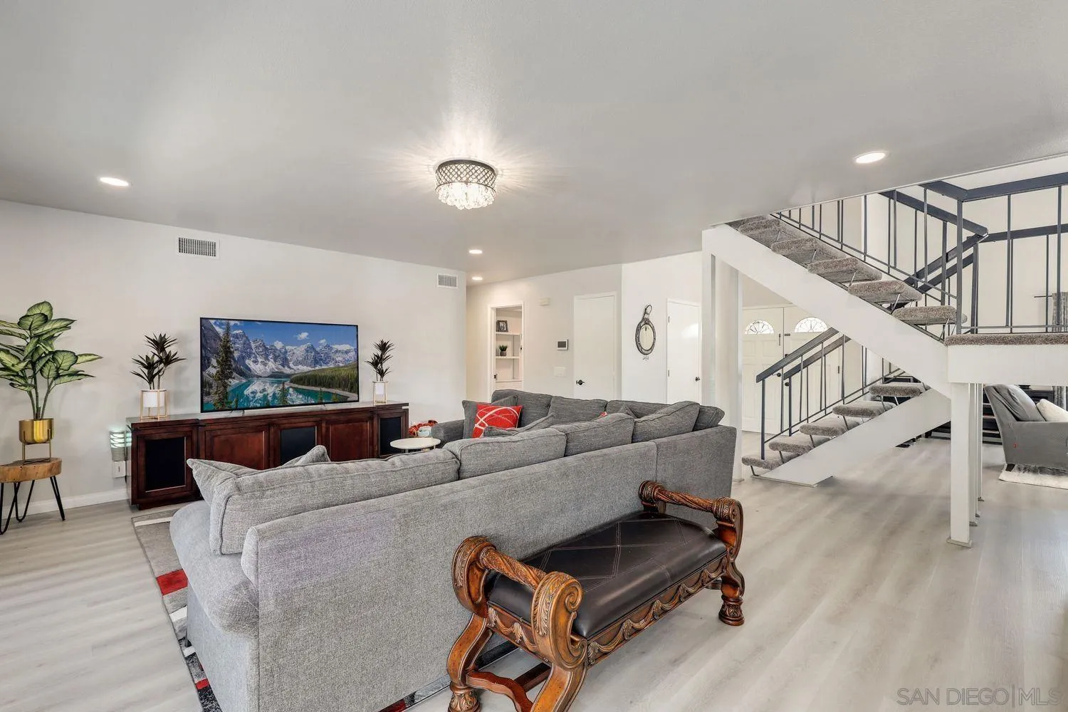 12496 Bodega Road San Diego, CA 92128 - Photo 12 of 44 a living room with furniture and wooden floor