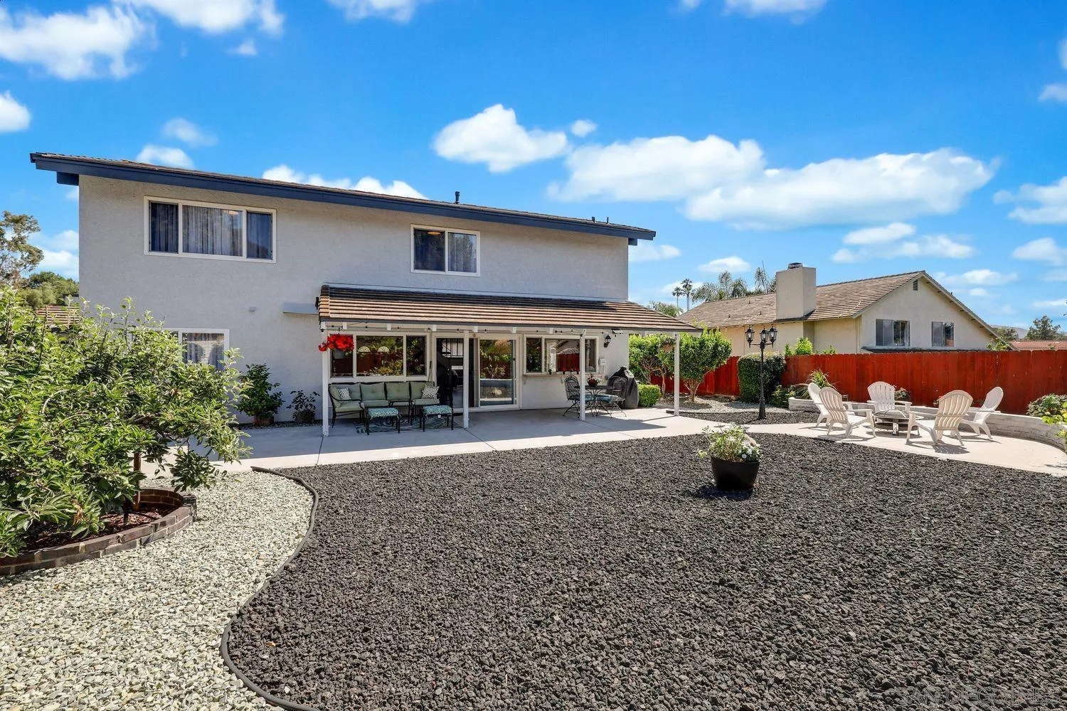 12496 Bodega Road San Diego, CA 92128 - Photo 28 of 44 a view of house with outdoor space and sitting area
