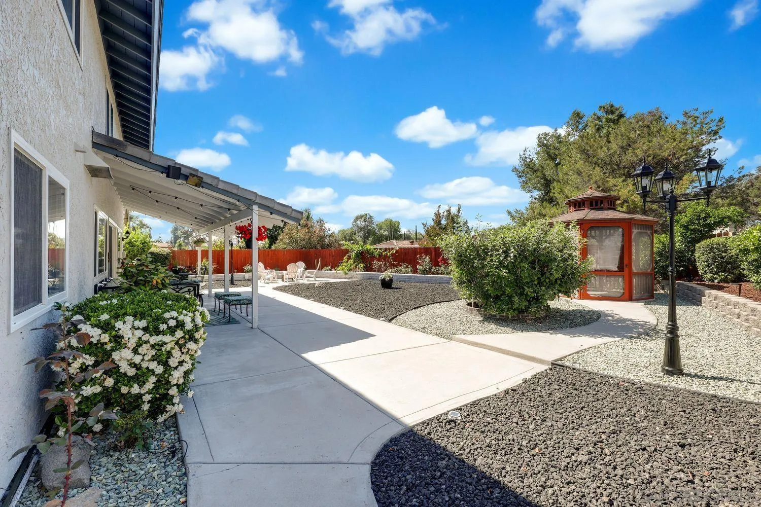 12496 Bodega Road San Diego, CA 92128 - Photo 30 of 44 a outdoor space with lots of potted plants