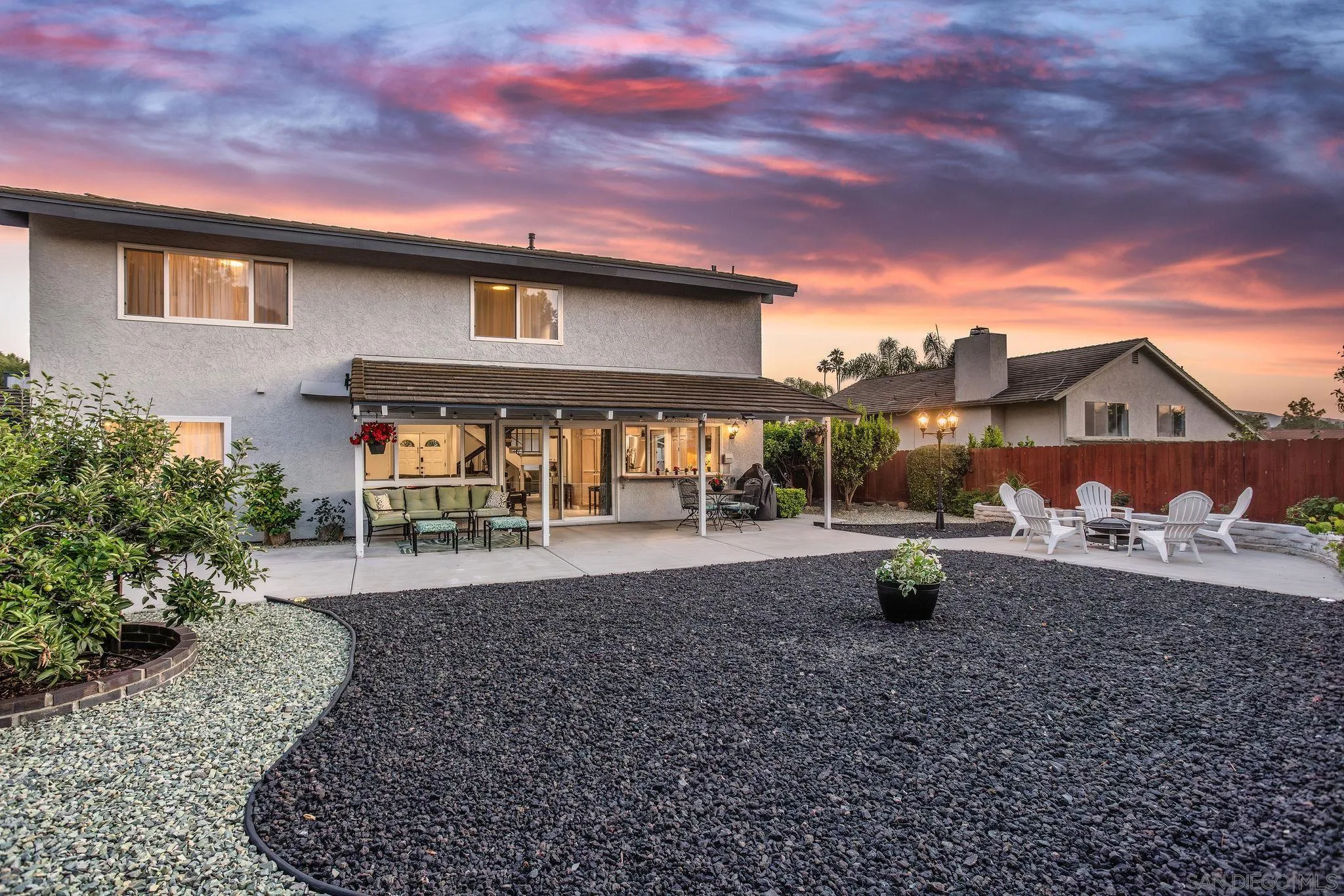 12496 Bodega Road San Diego, CA 92128 - Photo 3 of 44 a view of house with backyard and porch