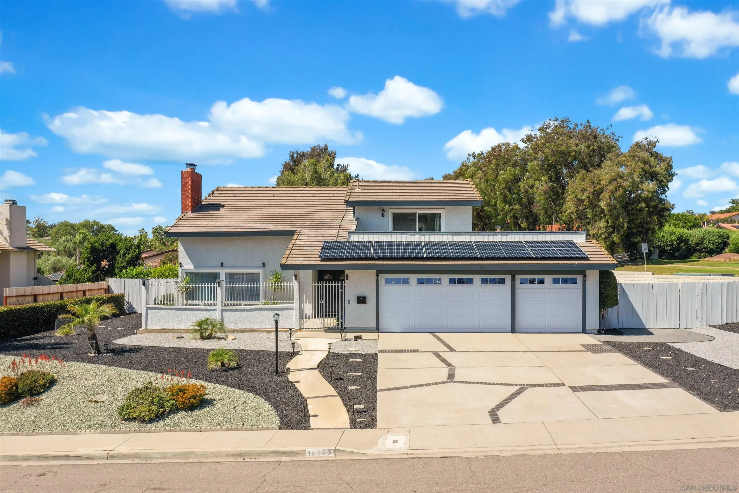 12496 Bodega Road San Diego, CA 92128 - Photo 34 of 44 a front view of a house with a yard
