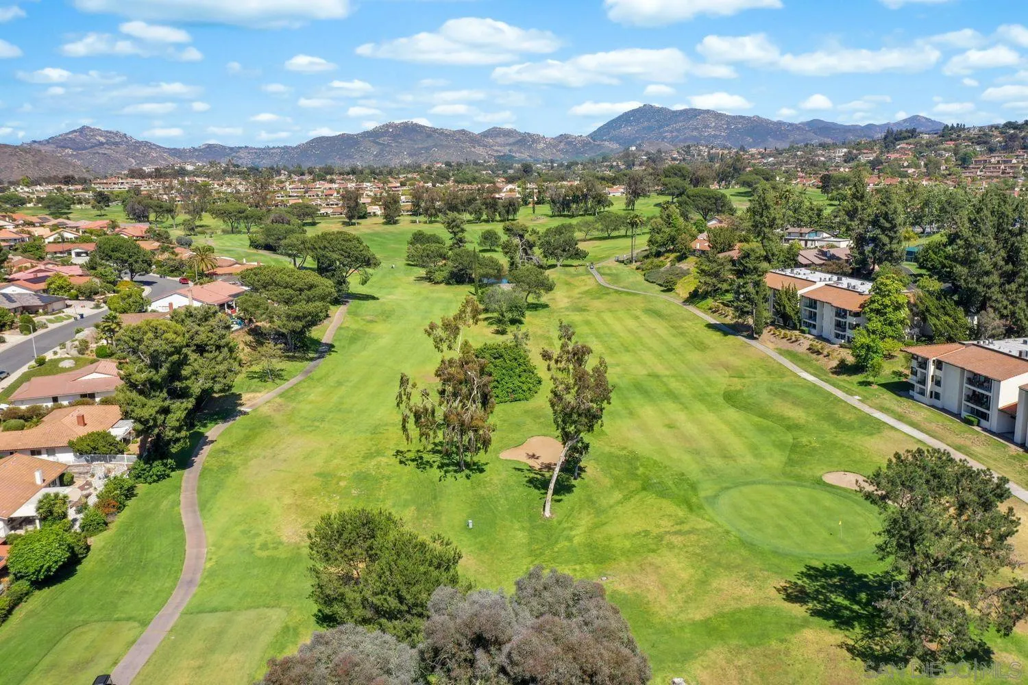 12496 Bodega Road San Diego, CA 92128 - Photo 37 of 44 a view of a city with mountains in the background