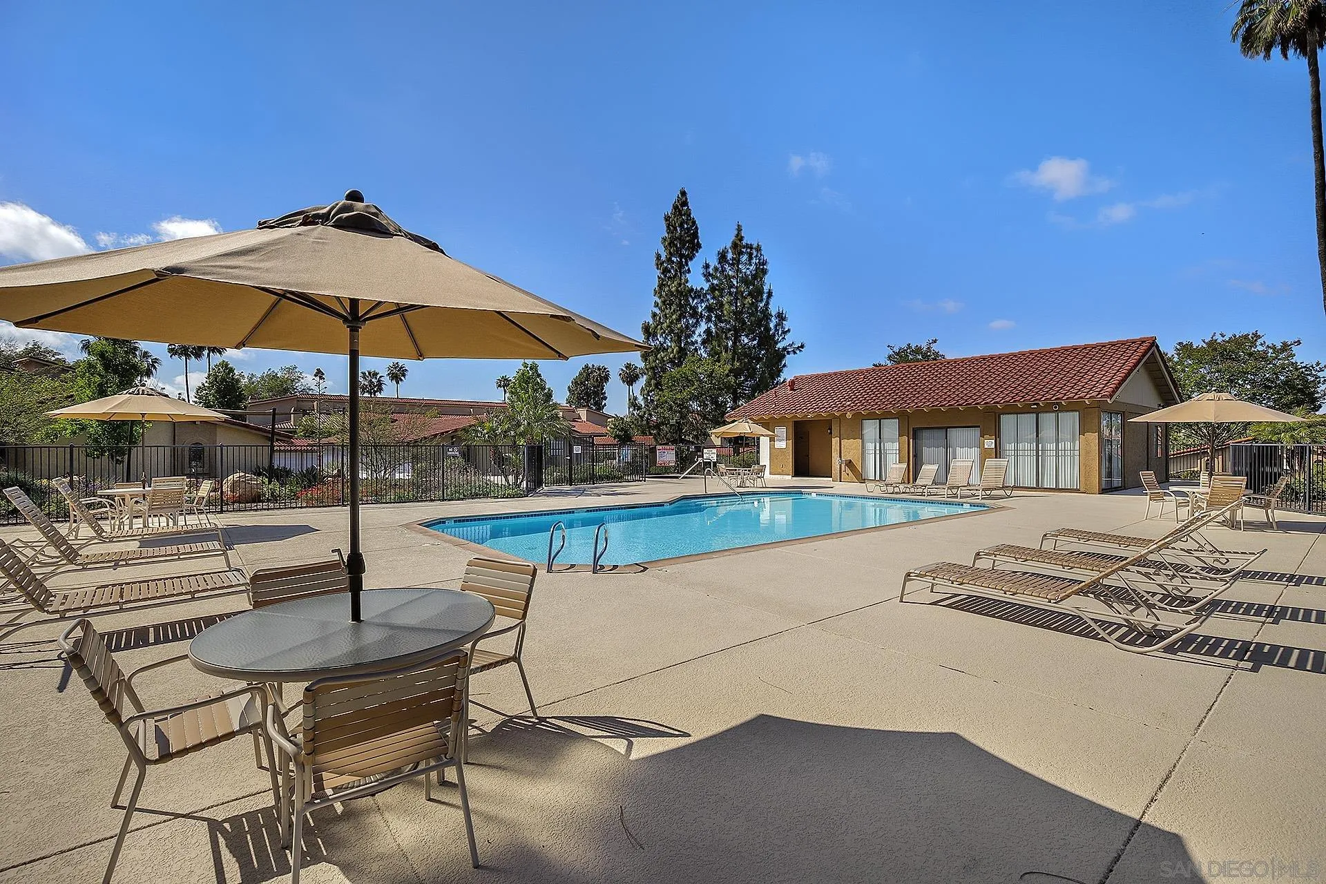 12496 Bodega Road San Diego, CA 92128 - Photo 40 of 44 a view of a house with pool and chairs