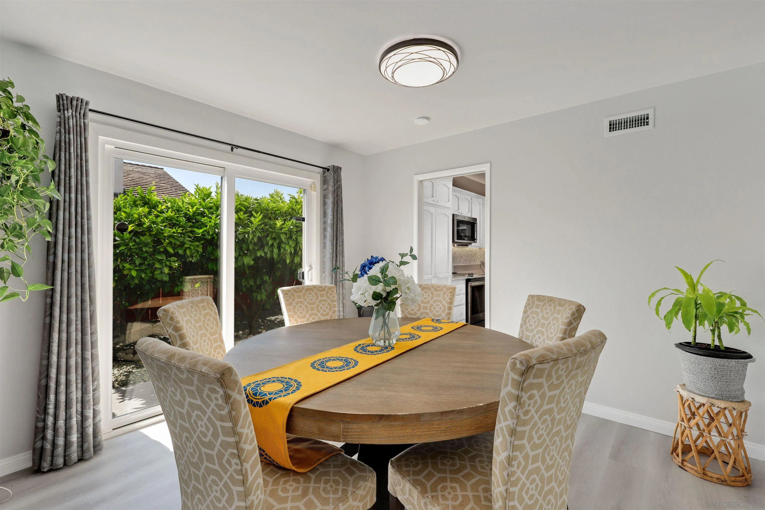 12496 Bodega Road San Diego, CA 92128 - Photo 5 of 44 a view of a dining room with furniture window and outside view