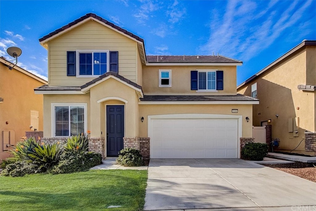 3104 Eastman Court Riverside, CA 92503 - Photo 1 of 1 a front view of a house with a yard