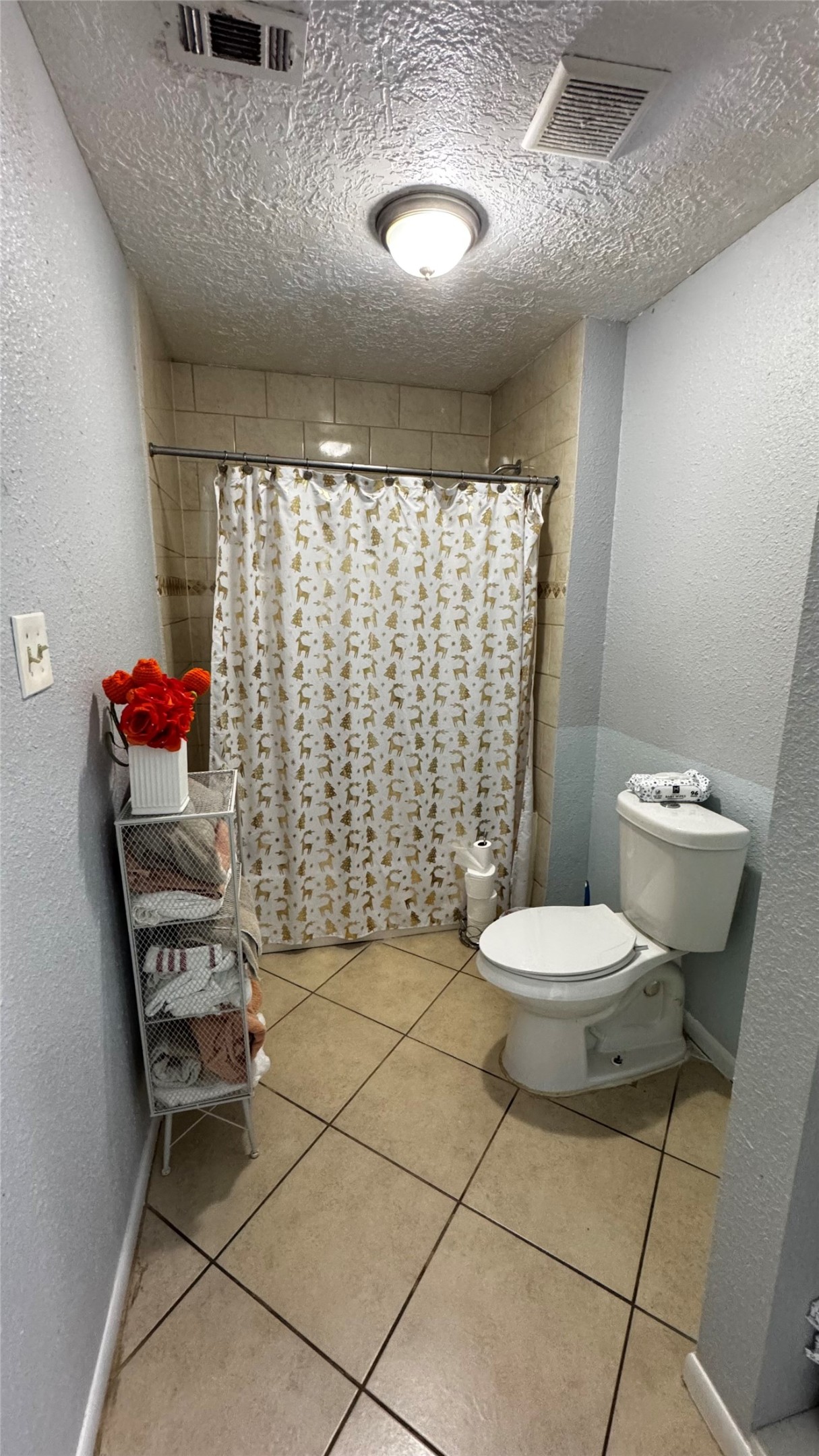 4709 34th Street East Dickinson, TX 77539 - Photo 15 of 30 a bathroom with a sink toilet and shower