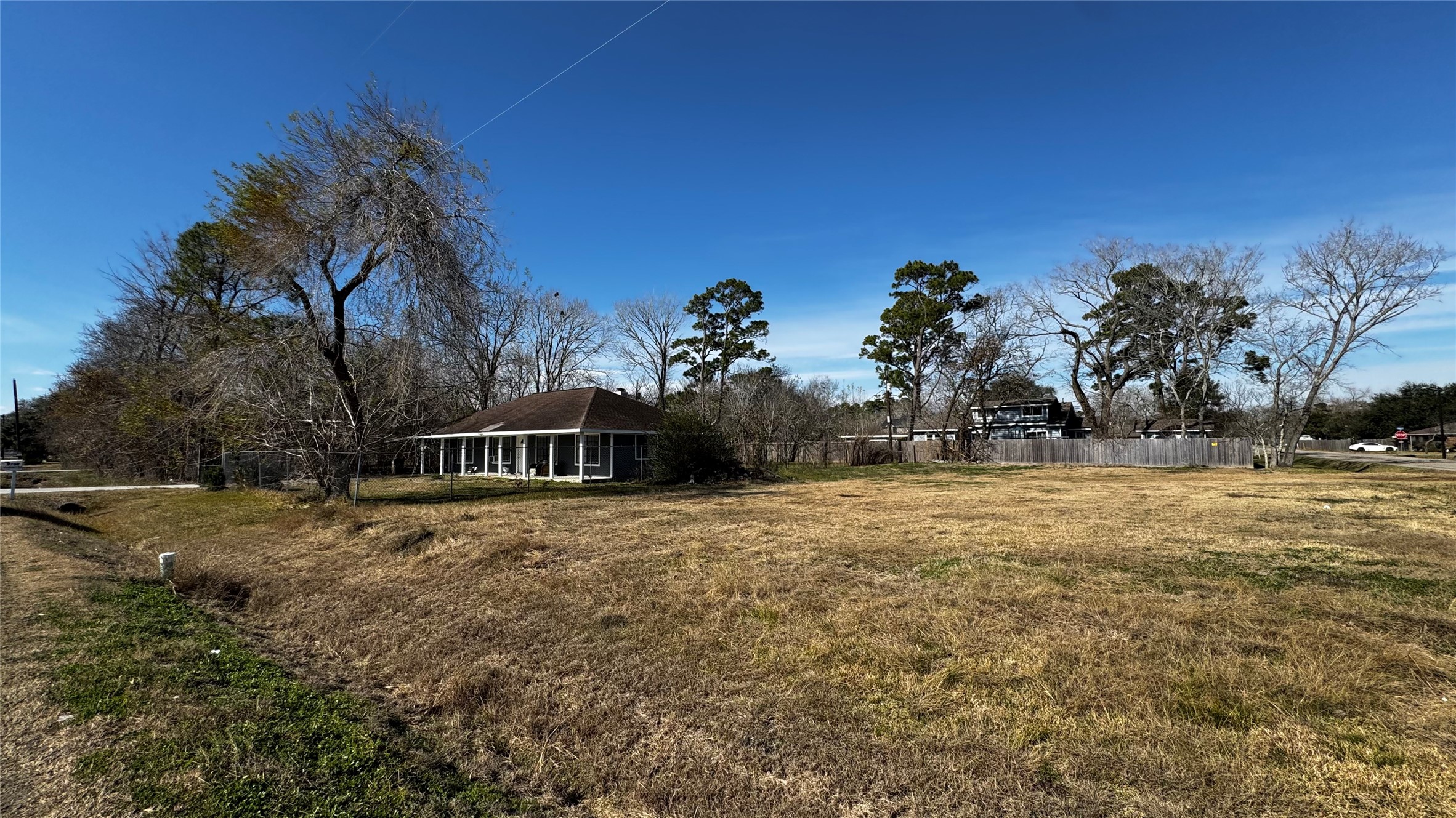 4709 34th Street East Dickinson, TX 77539 - Photo 28 of 30 a view of a field with trees in the background