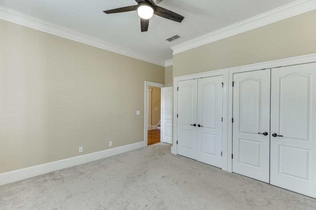 2390 Muskogee Lane Braselton, GA 30517 - Photo 29 of 40 wooden floor in an empty room