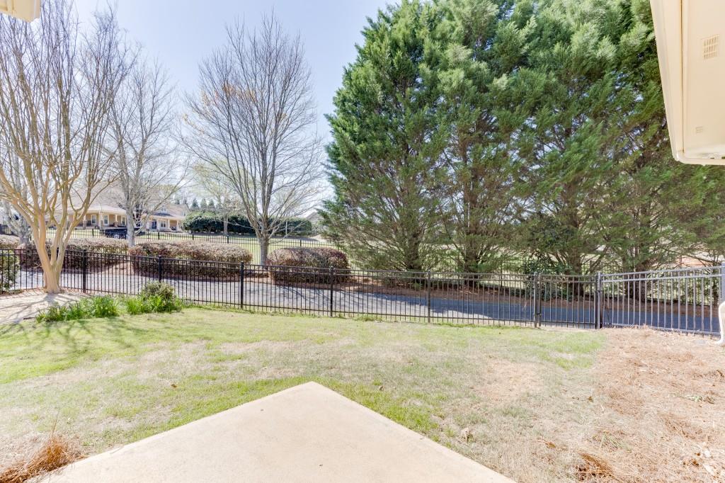 2390 Muskogee Lane Braselton, GA 30517 - Photo 35 of 40 a view of a yard with swimming pool