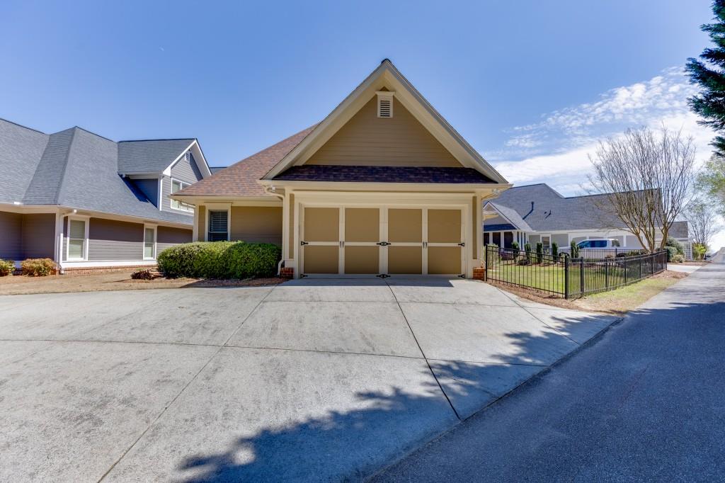 2390 Muskogee Lane Braselton, GA 30517 - Photo 37 of 40 a front view of a house with a yard