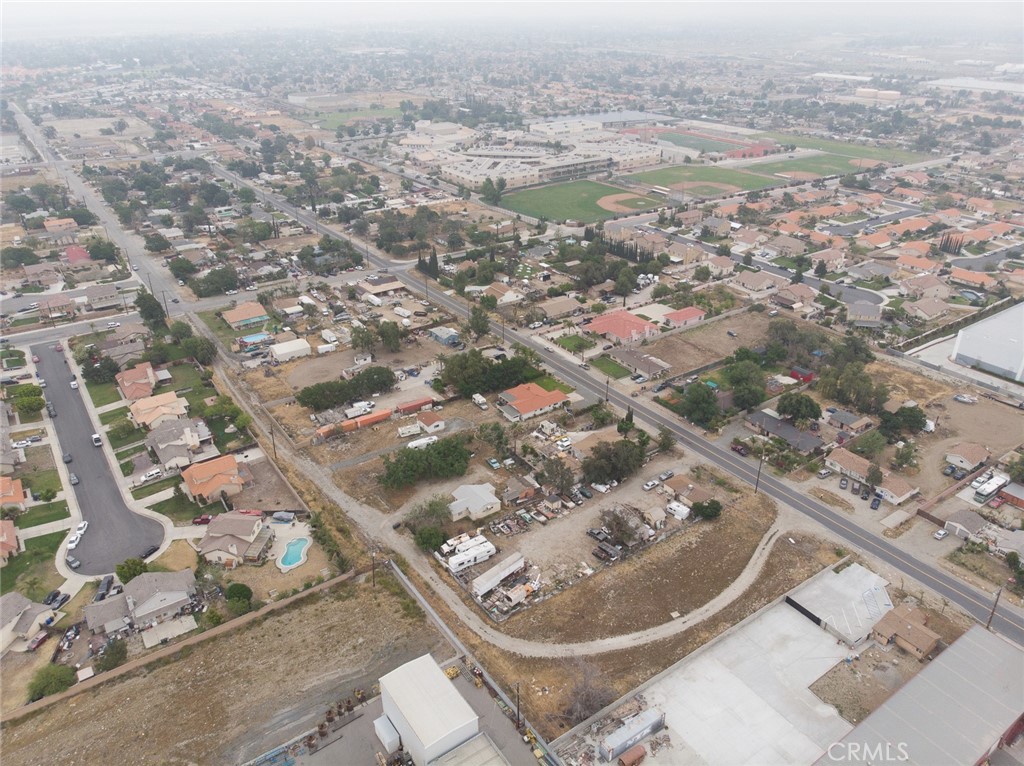0 West Persimmon Avenue Rialto, CA 92377 - Photo 18 of 31 an aerial view of a house with yard