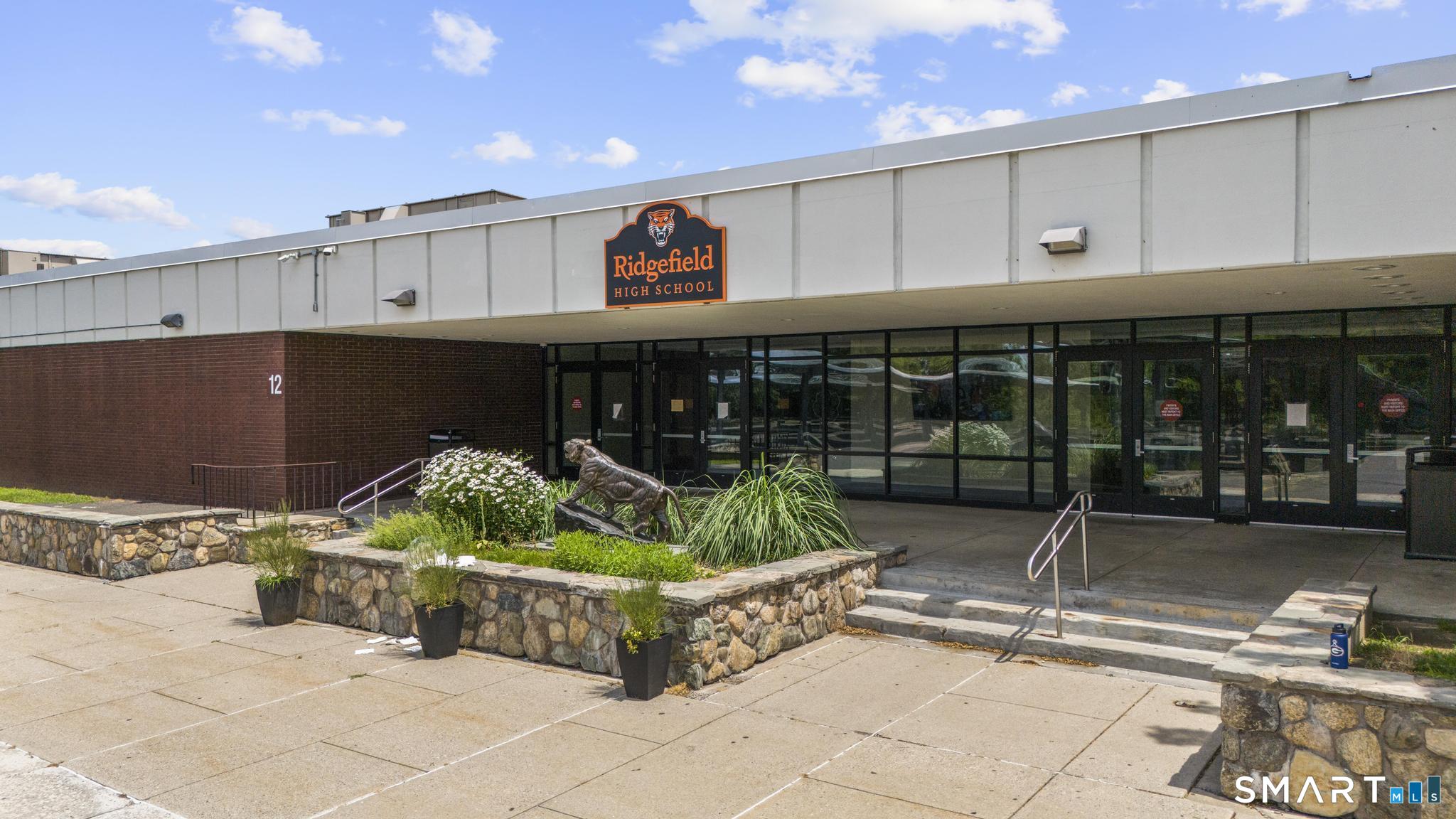 8 Summit Lane Ridgefield, CT 06877 - Photo 21 of 40 a view of an chairs and table in the patio