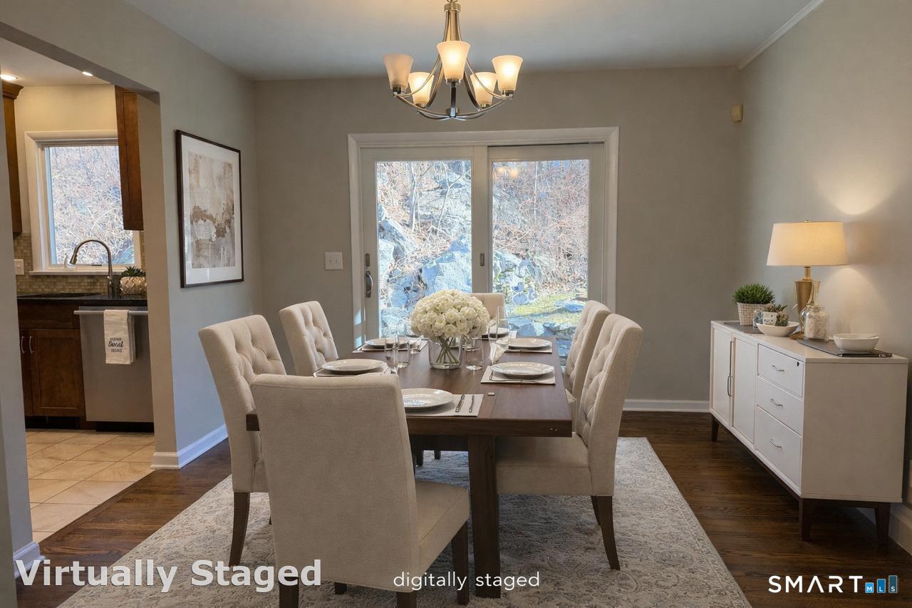 8 Summit Lane Ridgefield, CT 06877 - Photo 25 of 40 a dining room with furniture a chandelier and window