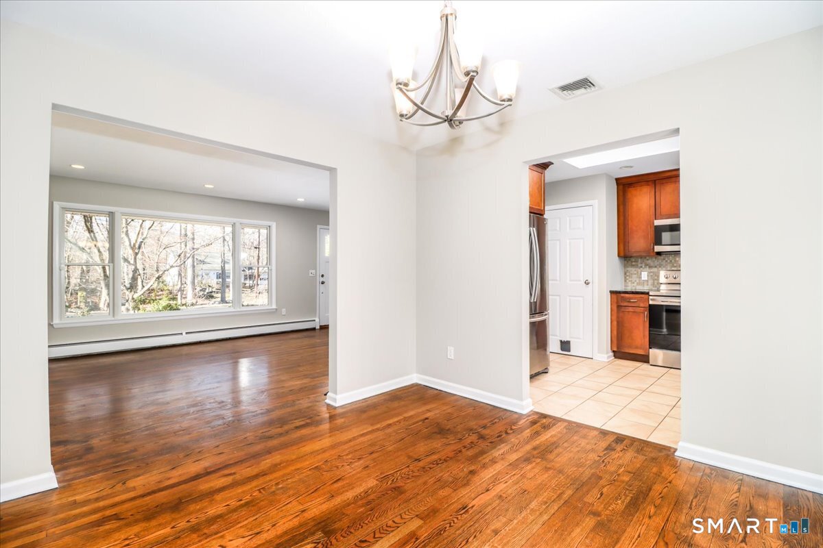 8 Summit Lane Ridgefield, CT 06877 - Photo 8 of 40 a view of a room with wooden floor and window