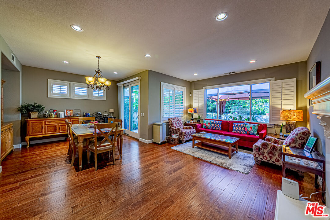 23208 Maple Avenue Torrance, CA 90505 - Photo 11 of 62 a living room with furniture and wooden floor