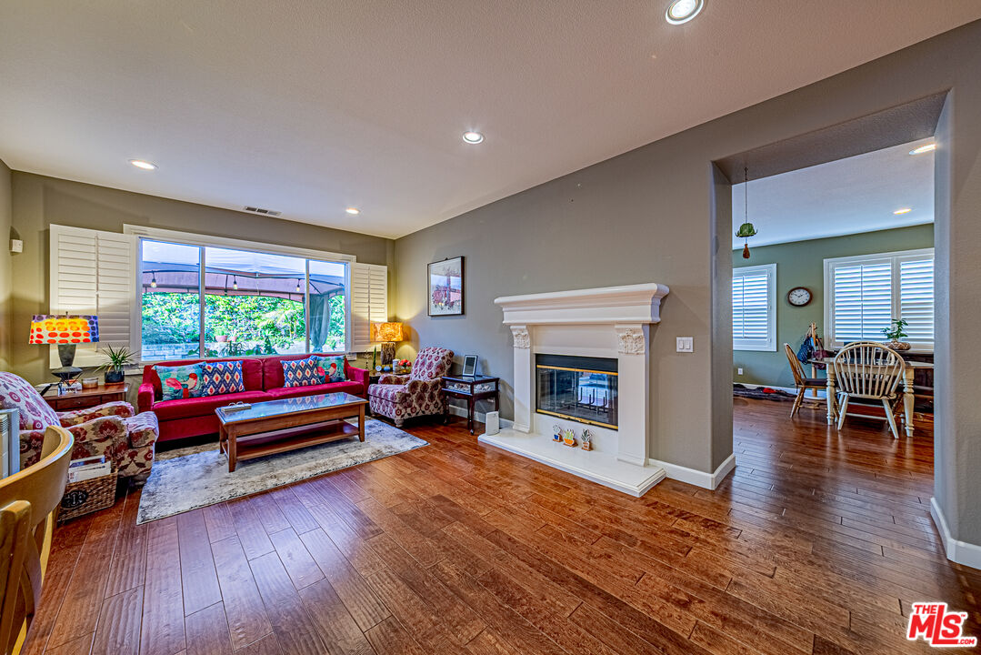 23208 Maple Avenue Torrance, CA 90505 - Photo 13 of 62 a living room with furniture and a fireplace