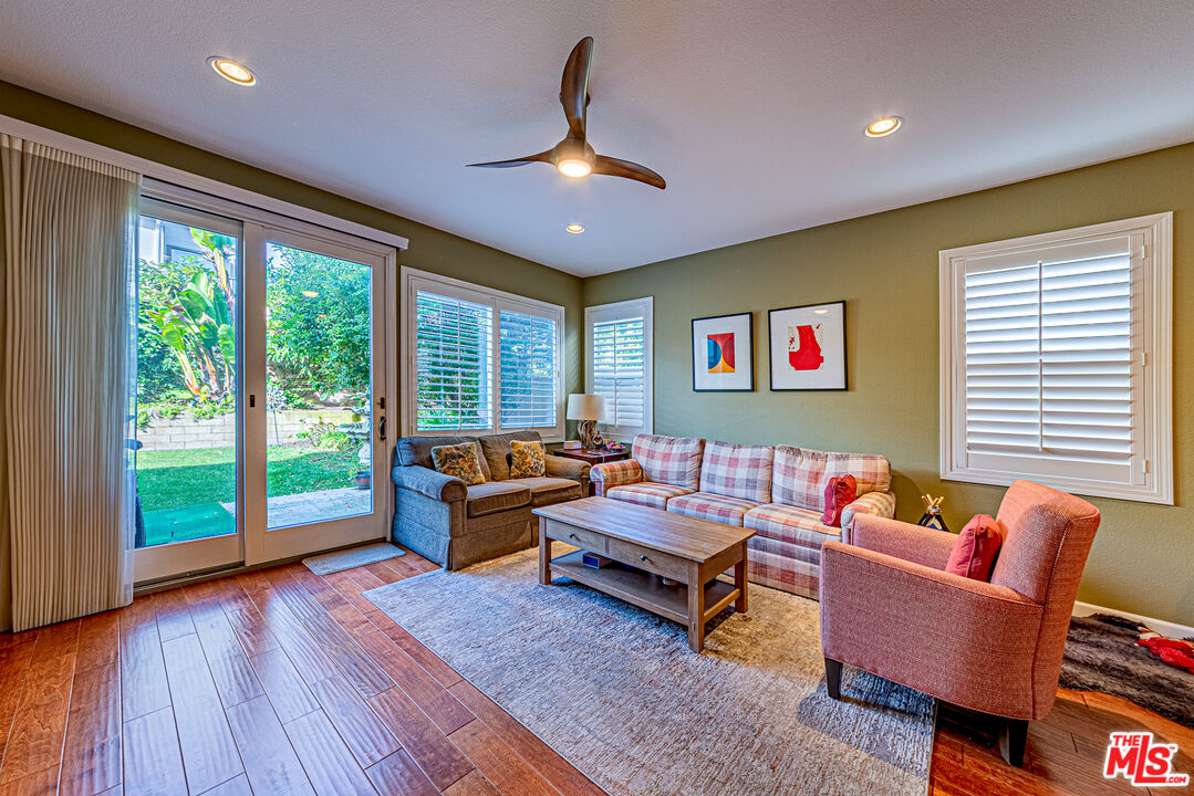 23208 Maple Avenue Torrance, CA 90505 - Photo 22 of 62 a living room with furniture and a large window