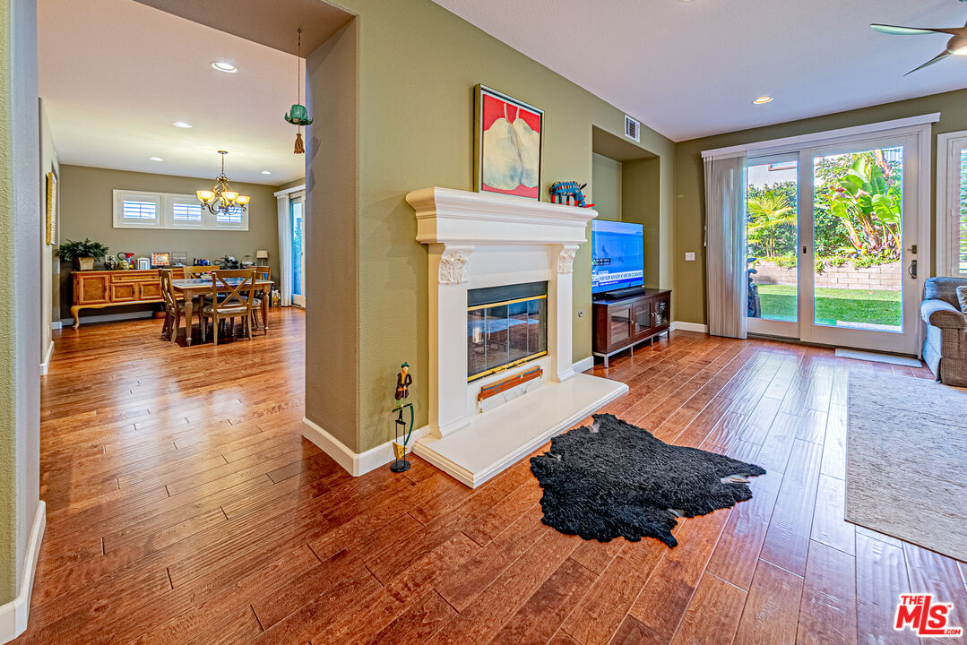 23208 Maple Avenue Torrance, CA 90505 - Photo 24 of 62 a living room with furniture and a fireplace