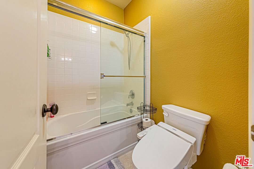 23208 Maple Avenue Torrance, CA 90505 - Photo 30 of 62 a bathroom with a toilet and a shower