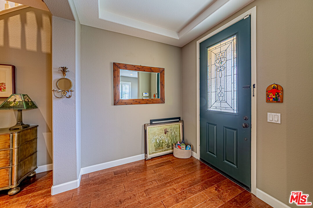 23208 Maple Avenue Torrance, CA 90505 - Photo 31 of 62 a view of an entryway with wooden floor