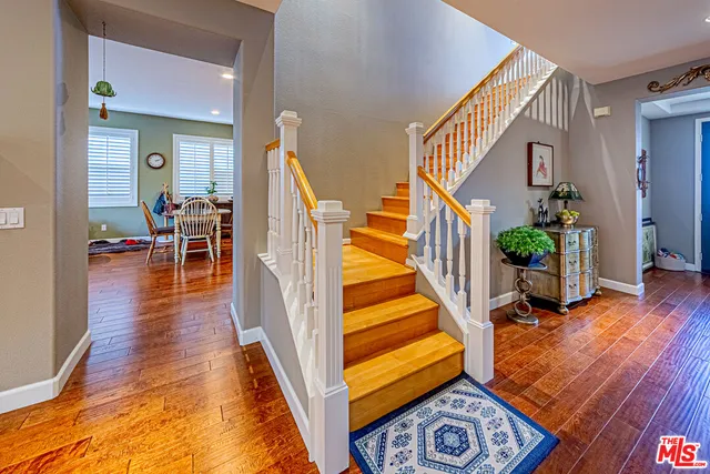 a room with furniture and wooden floor