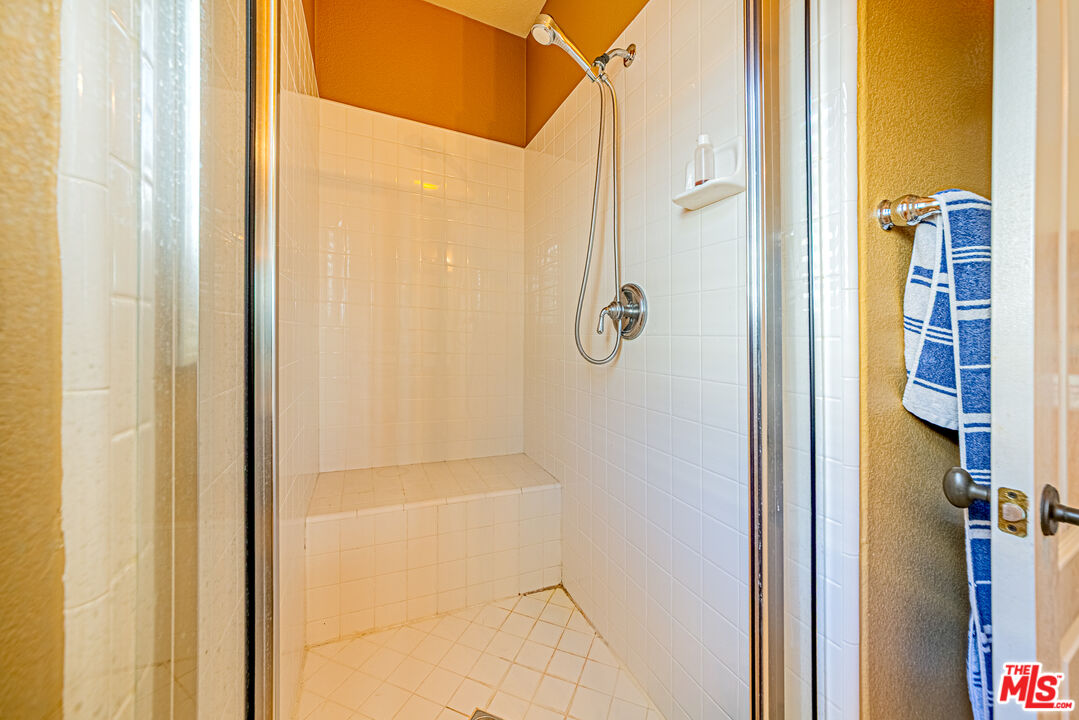 23208 Maple Avenue Torrance, CA 90505 - Photo 4 of 62 a bathroom with a shower