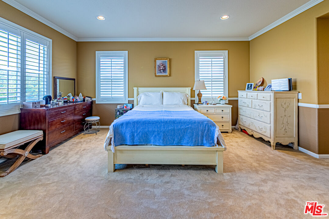 23208 Maple Avenue Torrance, CA 90505 - Photo 41 of 62 a bed room with a bed and a chair