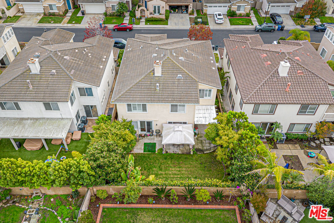 23208 Maple Avenue Torrance, CA 90505 - Photo 57 of 62 an aerial view of a house with a yard and potted plants