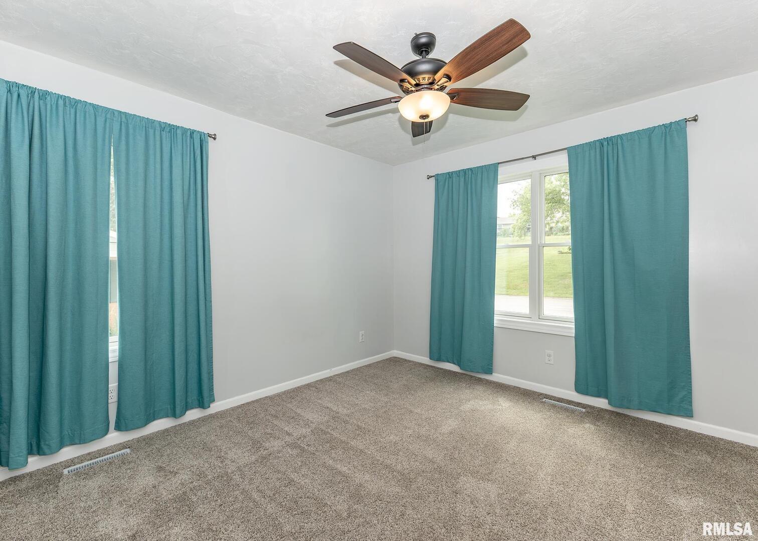 321 Pin Oak Drive Geneseo, IL 61254 - Photo 30 of 42 a view of an empty room with a window