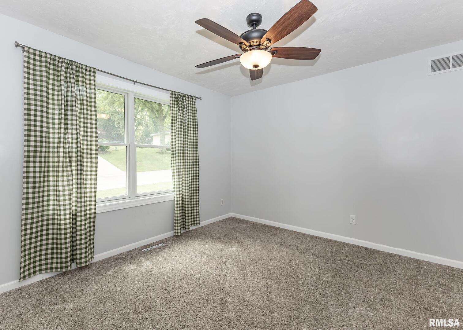 321 Pin Oak Drive Geneseo, IL 61254 - Photo 32 of 42 an empty room with a window