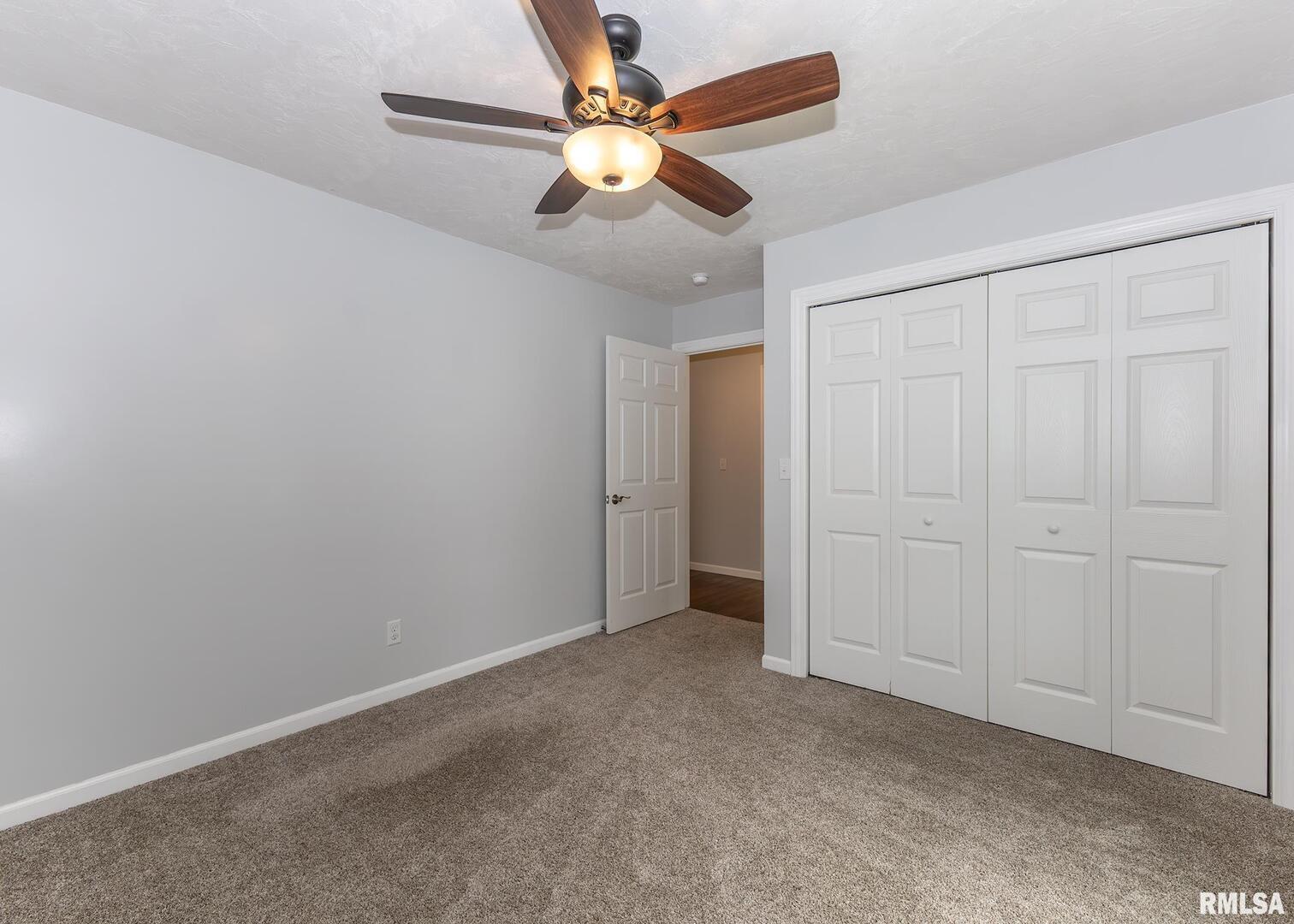 321 Pin Oak Drive Geneseo, IL 61254 - Photo 33 of 42 an empty room with fan