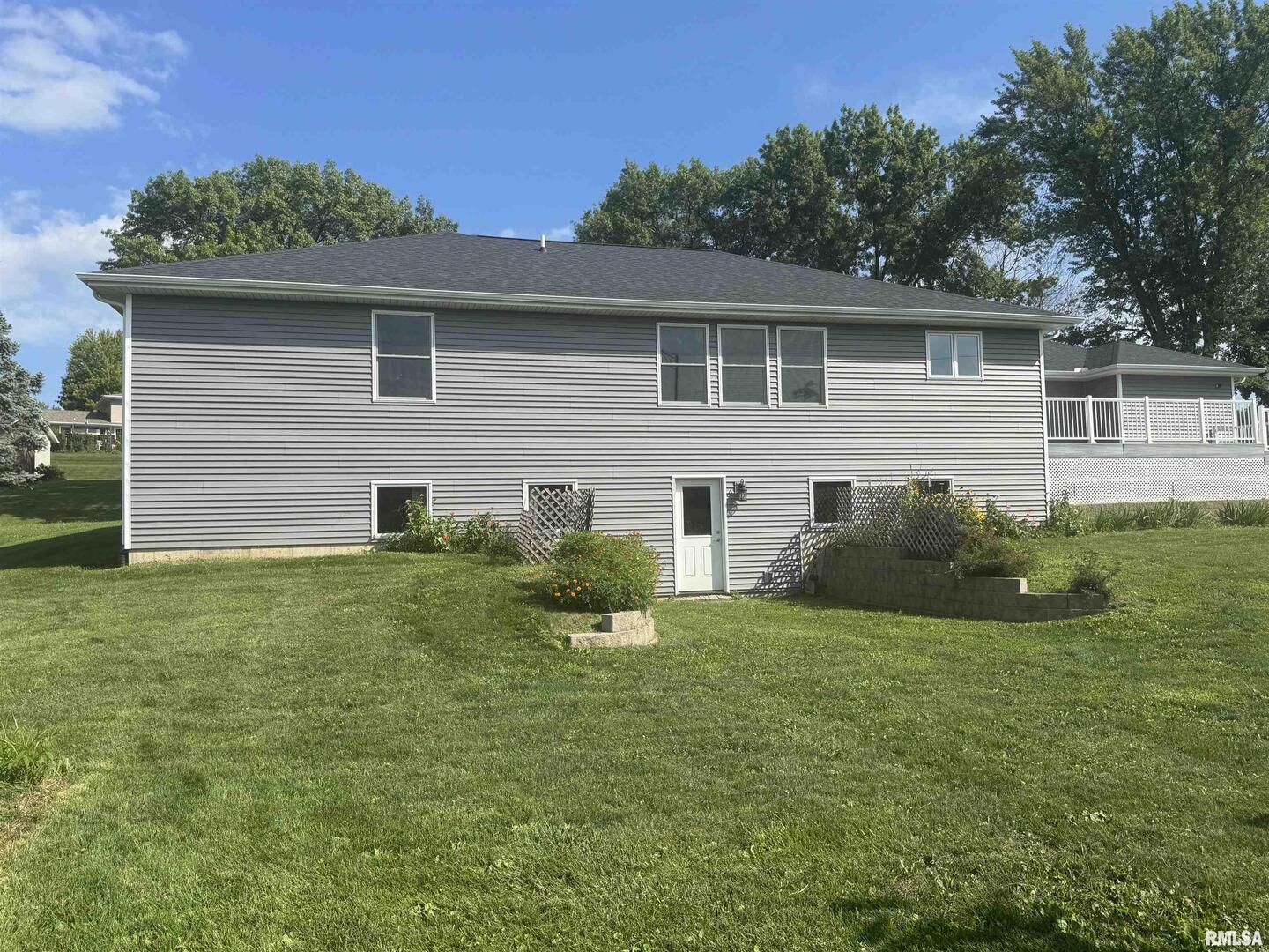 321 Pin Oak Drive Geneseo, IL 61254 - Photo 38 of 42 a view of a house with a backyard