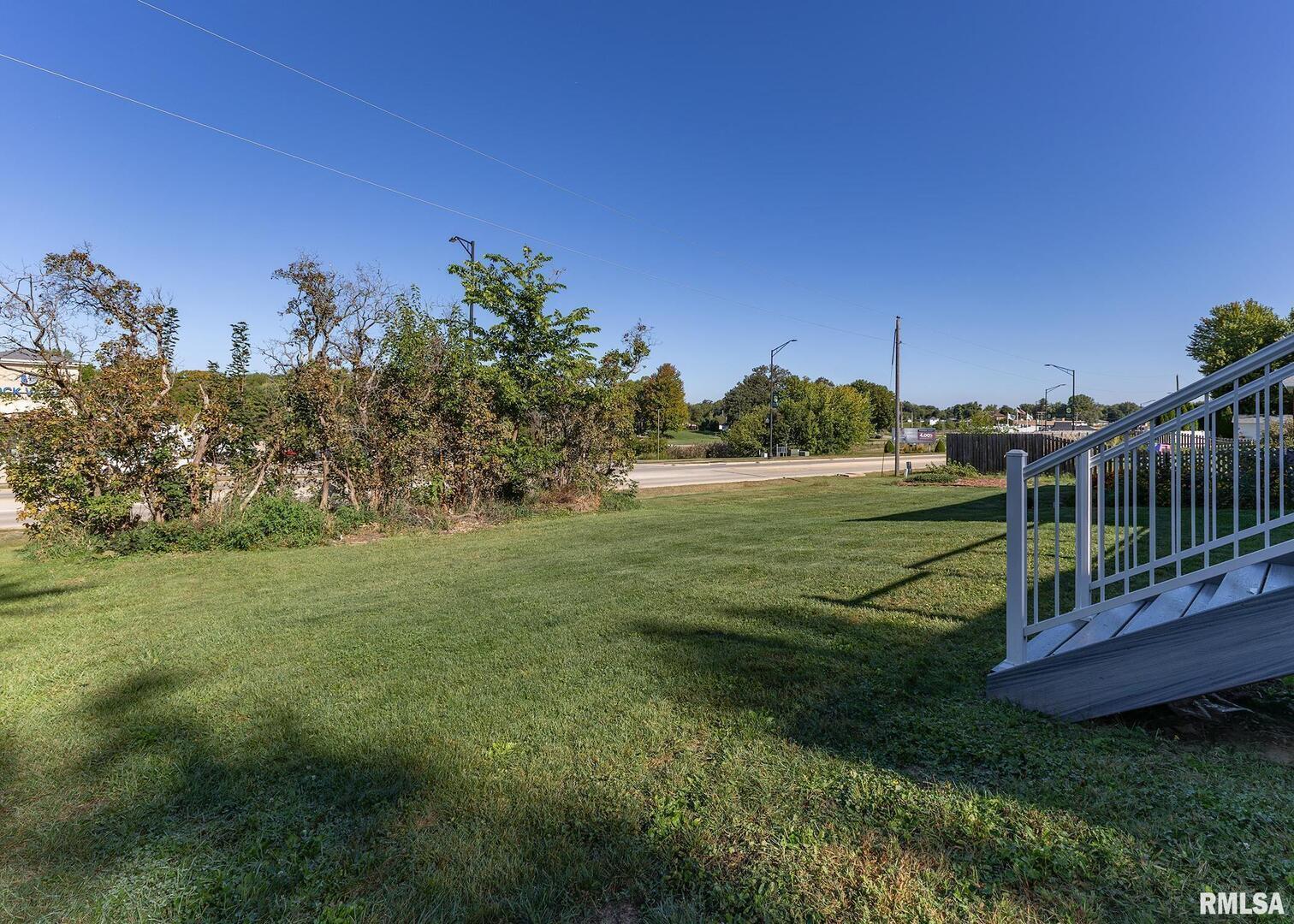 321 Pin Oak Drive Geneseo, IL 61254 - Photo 6 of 42 a view of a field with sitting area