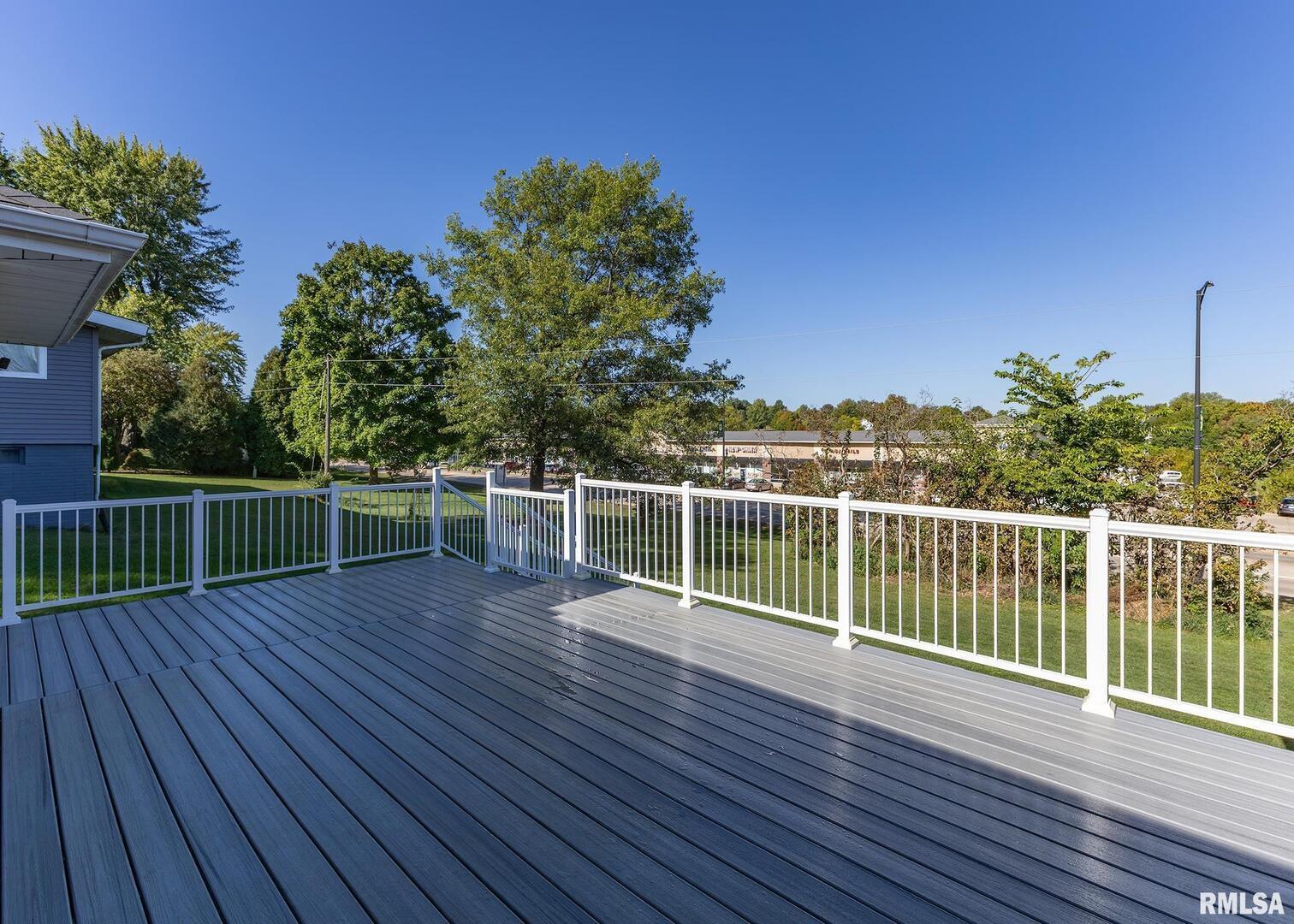 321 Pin Oak Drive Geneseo, IL 61254 - Photo 10 of 42 a view of a balcony with wooden floor