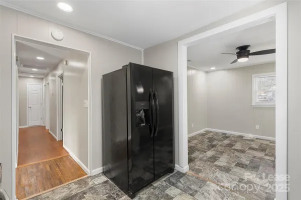 a view of a kitchen with a sink and a stove top oven