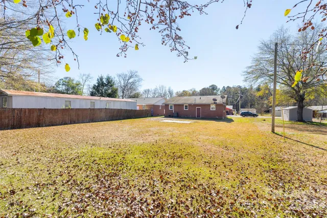 a view of a backyard of the house