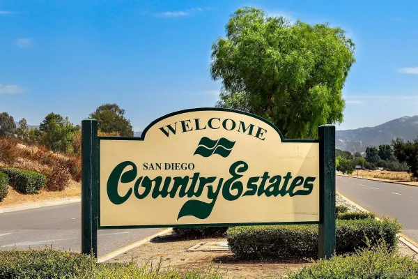 a sign broad on the side of the road