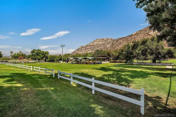 a view of a golf course with a lake