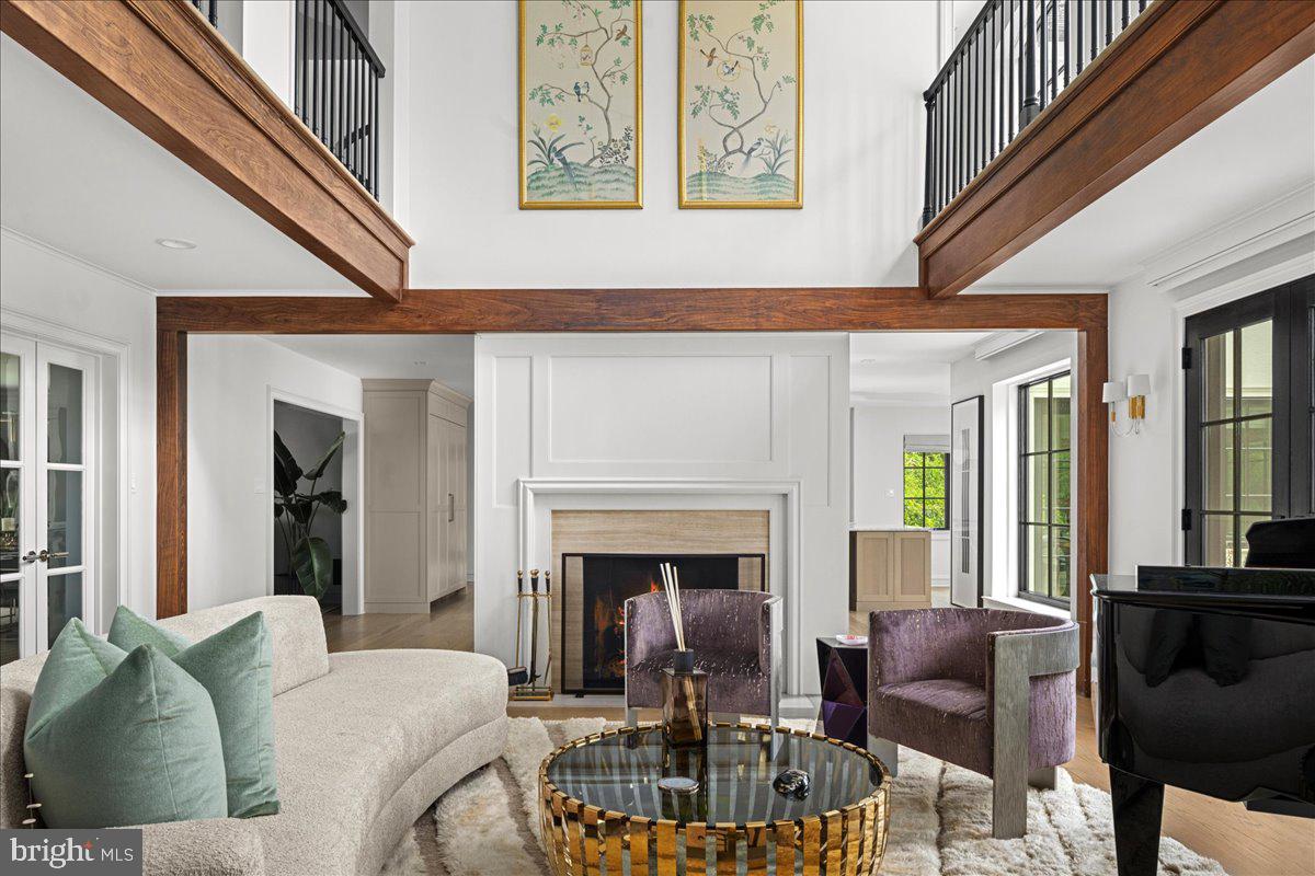 6450 Old Carversville Road New Hope, PA 18938 - Photo 15 of 89 a living room with furniture a fireplace and a large window