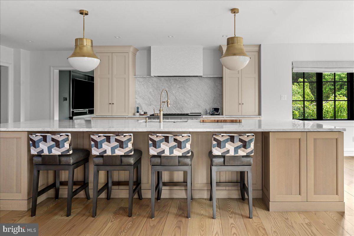6450 Old Carversville Road New Hope, PA 18938 - Photo 23 of 89 a kitchen with a table chairs and a stove