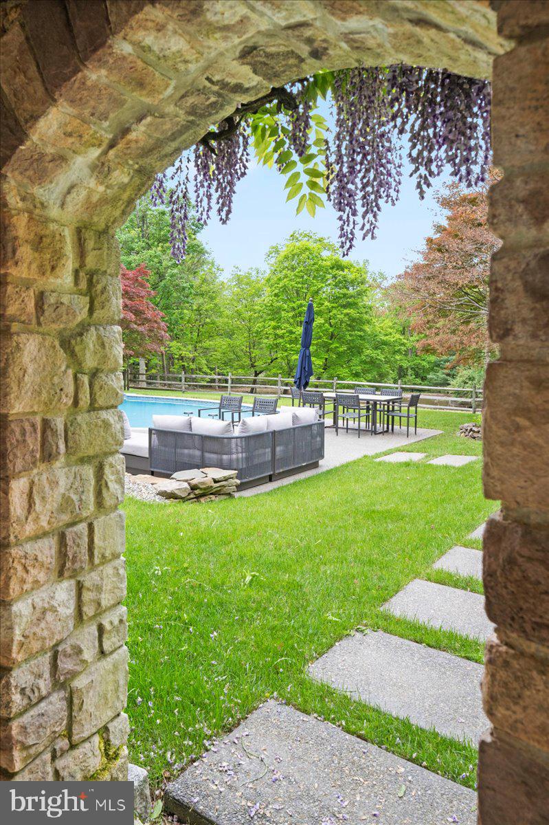 6450 Old Carversville Road New Hope, PA 18938 - Photo 67 of 89 a view of a garden with a building in the background