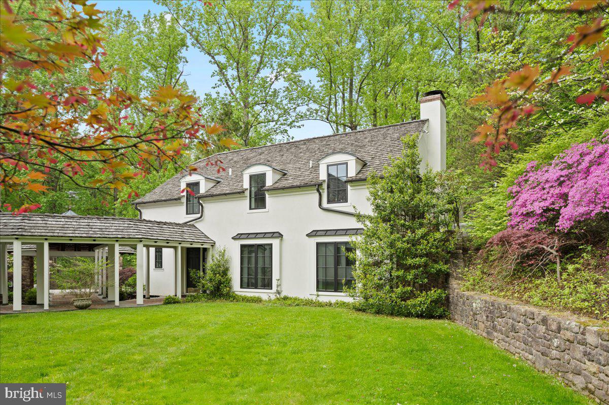 6450 Old Carversville Road New Hope, PA 18938 - Photo 73 of 89 a view of a white house with a big yard and large trees