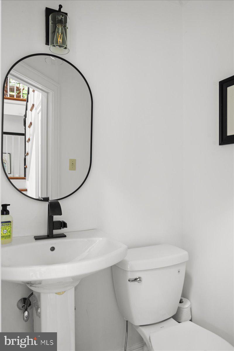 6450 Old Carversville Road New Hope, PA 18938 - Photo 85 of 89 a bathroom with a toilet a sink and mirror