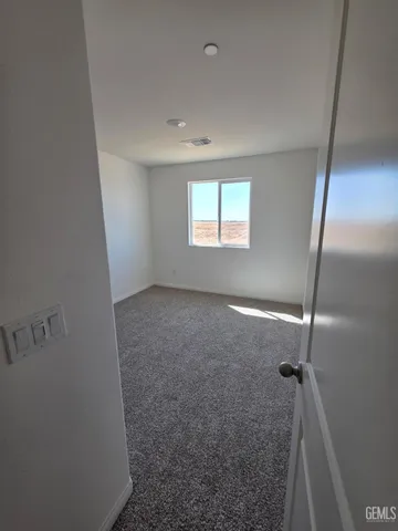 a view of hallway with a window